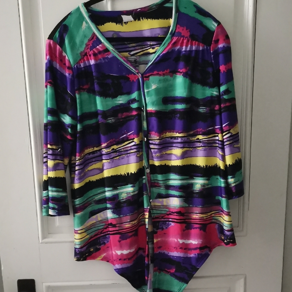 Artsy women's button down blouse with tie. 3/4 sleeves with roll up tabs. Size M